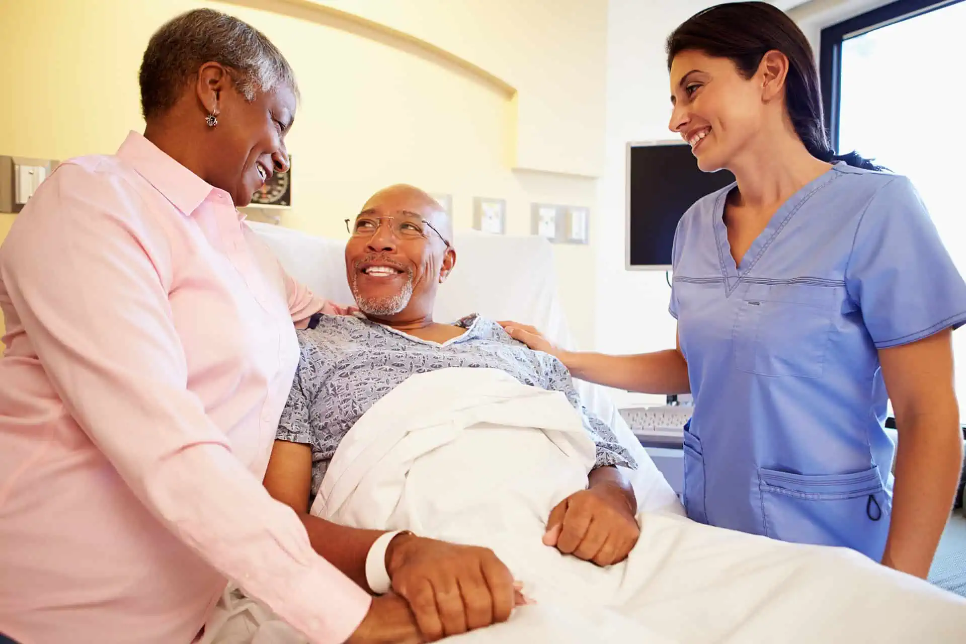 a man in a hospital bed
