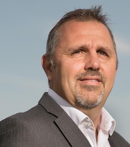 a headshot of Michel Feraud
