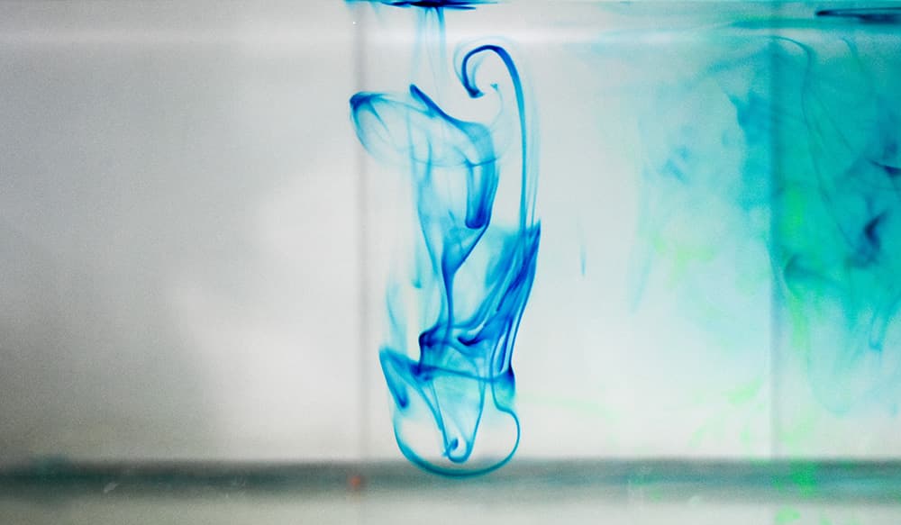 blue dye dispersing in solution