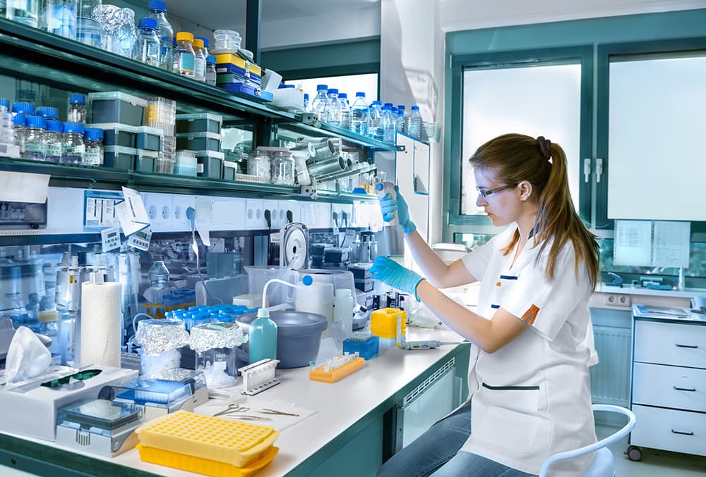a scientist performing tests in a lab
