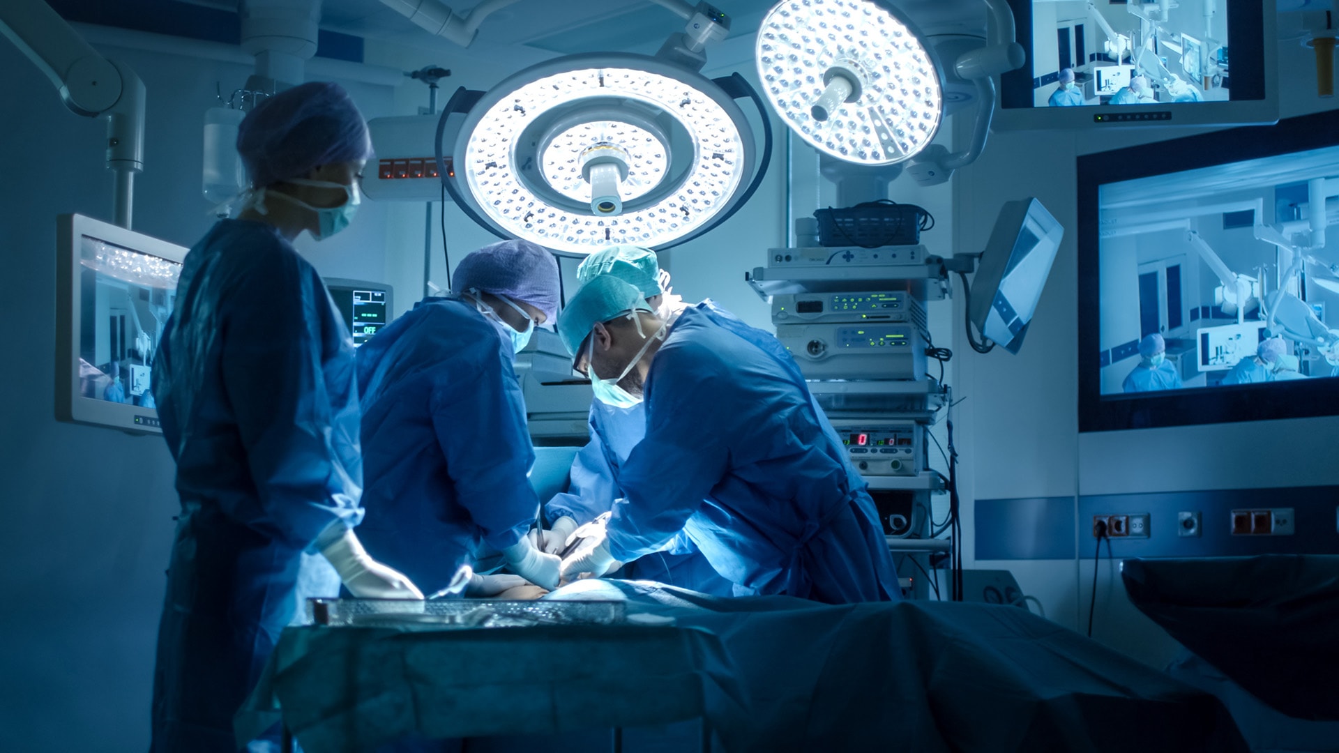 Scientists performing surgery operating room